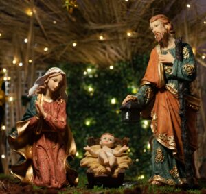 Detailed nativity scene with figurines of Jesus, Mary, and Joseph.